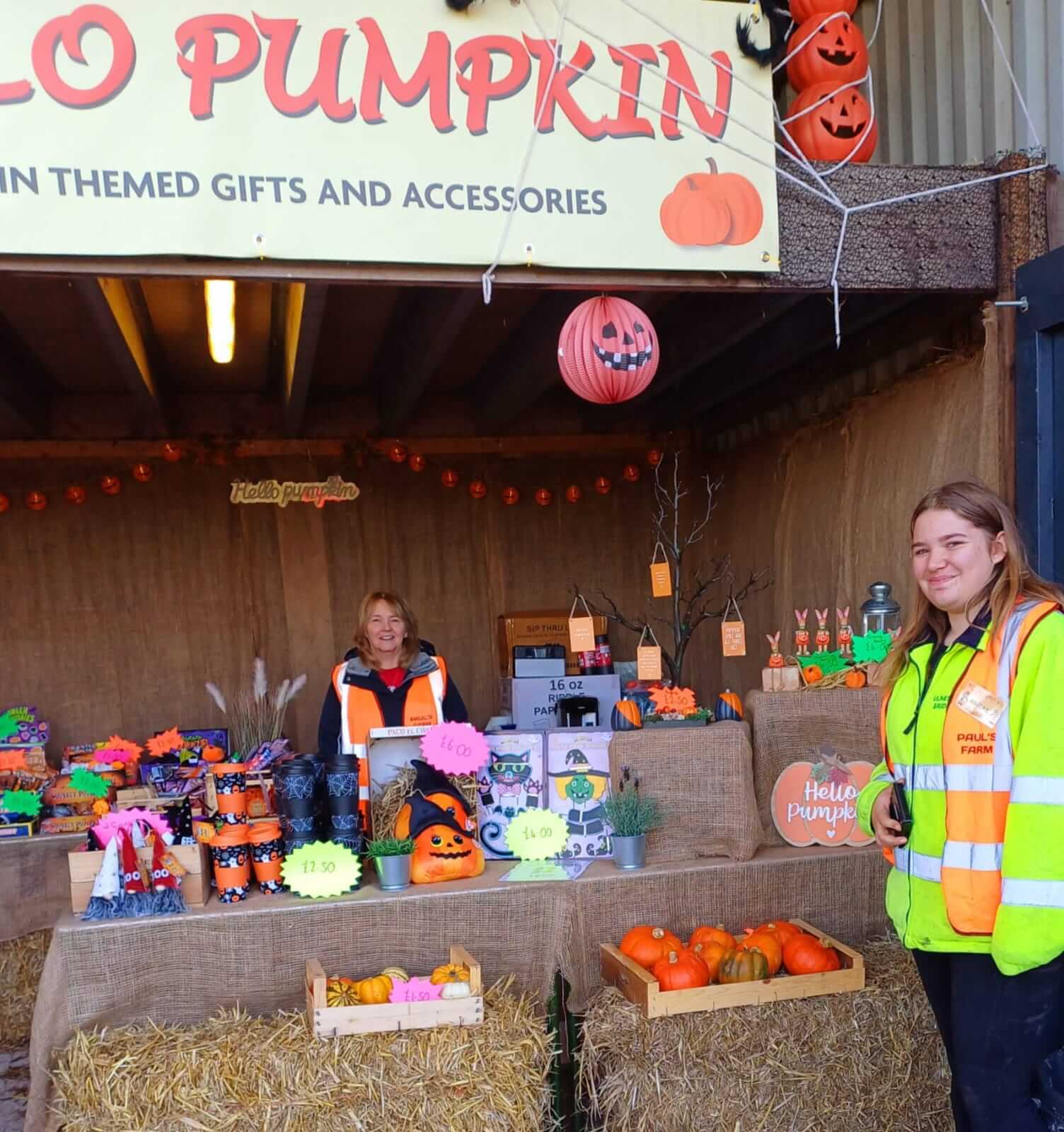 Little pumpkin pickers with their harvest